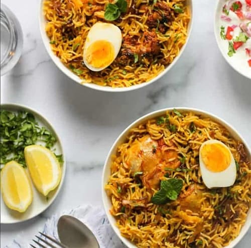 A photo of two bowls of curry