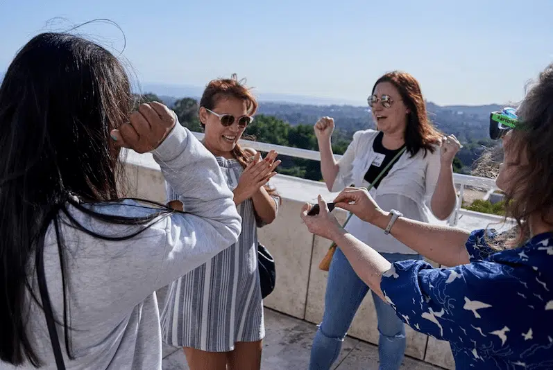 Group of women on patio cheering